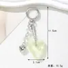 Bolso Creativo de Plata con Forma de Corazón y Lazo Accesorios para Ropa Llavero Versátil para Manualidades Colgante Pequeño Llavero Encanto