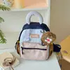 Nueva mochila infantil de estilo coreano con bloques de color, moderna y de gran capacidad, adecuada tanto para niños como para niñas, linda bolsa de mano para estudiante de primaria