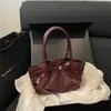 2026 Bolso Nuevo de Moda y Versátil con una Textura Elegante, Bolso de Hombro Cruzado Único, Diseño de Nicho, Bolso Cubo Casual para Mujer