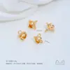 Chapado en cobre oro de 14K superficie lisa flor pequeña capullo rosa trébol de cuatro hojas trébol de tres hojas hojas dobles colgante accesorios hechos a mano para DIY
