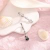 Pendientes de violín con diamantes asimétricos versátiles con hebilla para la oreja con diseño de nota de guitarra negra estilo europeo y americano para estudiantes artísticos