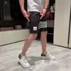 Pantalones cortos de marca de moda para hombre, corte slim, estilo coreano, pantalones cropped con espíritu social, pantalones cropped de celebridad de Internet, pantalones cortos de playa del mismo estilo