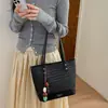 Bolso vintage de nicho de alta gama para mujer 2026 nuevo otoño versátil casual bandolera súper popular bolsa de mano para ir al trabajo