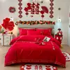 Juego de ropa de cama para boda, con bordado amigable con la piel, un juego de cuatro piezas con un vibrante diseño de dragón y fénix rojo, y tela de algodón de alto recuento, nuevo estilo 2026