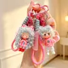 Llavero Colgante Estilo Pareja Fresco de Moda Dibujos Animados Niño Niña Ola Grande Muñeca de Bomba de Leche Encanto para Bolso de Mujer Regalo