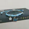 Nova versão coreana de pulseira simples de flor borboleta presente para estudantes namoradas tecelagem manual joias transfronteiriças atacado