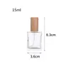 Al por mayor en stock Múltiples especificaciones y estilos Botella dispensadora de perfume simple y portátil Botella rociadora Botella dispensadora cosmética Tapa de madera