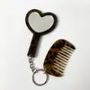 Nuevo Set de Espejo y Peine en Forma de Corazón, Accesorio de Bolso Simple y Versátil, Llavero de Peine con Mango Portátil