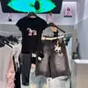 Elegante camiseta negra de cuello redondo, hombros normales, manga corta para mujer, nuevo modelo verano 2026, única, súper elegante, top estilizado