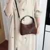Bolso de mano elegante y versátil para mujer, perfecto para ir al trabajo, con un diseño único y una nueva colección 2026. Se puede llevar en la mano o usar como bolso de hombro o bolso cruzado.