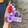 Chaveiro Gravador de Vídeo Desenho Animado Criativo Brinquedo Luminoso de Projeção Desenho Animado Pingente de Mochila Infantil Presente