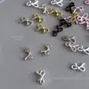 Mini Lazo Arte de Uñas Aleación Joyería Tridimensional Mixto Flotante Corbata de Moño Diamante de Uña Simple Versátil Decoración Mayoreo