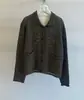 Enviado: Cardigan de outono novo, chique coreano, doce, com trança vazada, suéter de tricô casual solto feminino 19924