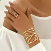 Pulsera y anillo de oro de diseño europeo y americano transfronterizo, a la moda y únicos, diseño abierto exagerado, juego de dos piezas de joyería de lujo ligero
