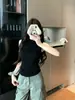 Colete Tricô Feminino Sem Manga de Outono com Gola Alta Micro e Ponto Trançado nas Cores Caramelo e Cinza