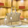 Bolsa de mano tipo tote con estampado retro de aspecto elegante para mujer 2025 Nuevo Bolso de hombro único cruzado de estilo de lujo ligero de alta gama