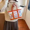 Bolso Cubo Versátil Estilo Cesta 2026 Nuevo Bolso de Mano de Moda Graffiti Bolso de Hombro Niche Cruzado Bolso para Viajes Diarios