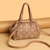 Bolso de mano con cierre de alta gama transfronterizo para mujer, diseño nuevo, elegante y sencillo, adecuado para madres de mediana edad, bolso de hombro y cruzado