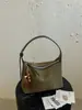Bolsa transversal de ombro único casual personalizada da moda, textura simples, novo modelo de bolsa, bolsa almofada feminina da moda para o verão de 2026