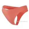 Calcinha fio dental feminina lisa de cor sólida estilo europeu e americano, sexy para yoga e fitness, cintura baixa, seda gelada, secagem rápida, design de peça única que levanta o bumbum