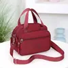 Bolsa de ombro feminina da moda, bolsa de tecido de nylon repelente de água, bolsa transversal, pequena bolsa de mão com vários compartimentos, bolsa feminina de grande capacidade