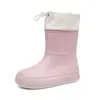 Nuevas botas de lluvia para mujer en tubo zapatos de goma usar antideslizante botas de agua suela gruesa zapatos de agua forro polar tubo corto cierre botas de lluvia transfronterizo