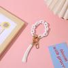 Nuevo llavero acrílico de gran venta, pequeño colgante de resina, pulsera con borla, llavero de moda, colgante para bolso de mujer.