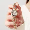 Reloj Irregular de Cruz para Dama Reloj de Pulsera para Mujer Bañera Versátil Sentido Reloj de Pulsera Venta al por Mayor