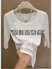 Blusa elegante de color morado, cuello en U, manga de tres cuartos, colección otoño/invierno 2026, hombro normal, corte ajustado, camiseta de manga corta acanalada para mujer