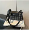 Bolsas de Design de Nicho de Alta Qualidade 2025 Novas Bolsas Femininas Populares Versáteis Bolsa Transversal Bolsa Popular de Ombro Único para Axila