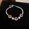 Pulseira redonda de flor de zircônia transfronteiriça europeia e americana, design de nicho requintado, luxo leve, toque de alta qualidade, acessório de mão versátil