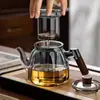 Nuevo Modelo de Tetera Doméstica de Vidrio, Alto Borosilicato, Resistente a Altas Temperaturas, Adecuada para Estufa Cerámica Eléctrica, para Hervir Agua y Preparar Té, Olla con Separación de Té y Agua, Venta al por Mayor de Juegos de Té