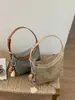 Bolsa de Palha Trançada 2026 Novo Estilo Bolsa Trançada Color-Blocking para Mulheres, Bolsa de Ombro de Grande Capacidade para Praia no Verão, Bolsa Transversal Tendência Atacado