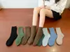 Calcetines de Media Pantorrilla para Mujer 2026 Nuevos de Otoño e Invierno Estilo Japonés Casual Estudiante Calcetines Simples de Moda Color Sólido Calcetines Holgados