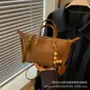 Bolso Cuadrado Pequeño de Cuero Suave Gamuza Melanoid para Mujer 2026 Nuevo Bolso de Mano Bolso Cruzado de Hombro Único de Moda