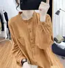 Camisa de manga comprida para primavera e outono de 2026, cor sólida, vintage, solta, moderna, versátil, estilosa, adequada para usar em camadas ou como peça externa