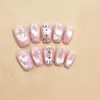 Uñas postizas transparentes tipo ojo de gato, suaves y favorecedoras, combinadas con lindos gatitos negros y patrones de corazón, crean una atmósfera dulce y encantadora.