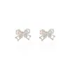 Pendientes de Flor y Lazo de Zirconia para Mujer, Púa de Plata, Súper Hada y Dulces de Cobre Microincrustados Nicho Lujo Accesible Gama Alta Versátiles