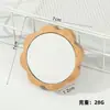 Espejo de maquillaje especial transfronterizo con mango, espejo de tocador de bambú y madera, espejo pequeño portátil de mano de alto valor para uso doméstico