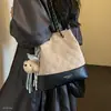 Mochila de ante de gran capacidad, bandolera, otoño 2026, estampado de leopardo de terciopelo, para el trabajo, bolso de mano para mujer, de un solo hombro a la moda, modelo nuevo
