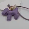 Funda para teléfono con borla de cachorro linda creativa, correa para llavero de coche, accesorio para bolso, universal para teléfonos móviles