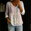 Nova camisa feminina de manga comprida com botões e gola V estampada transfronteiriça, elegante e estilosa para o trabalho, top casual único e moderno