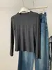Camiseta básica de color liso con cuello redondo Nuojiiji para mujer, alta elasticidad, adelgazante, versátil, camiseta de manga larga tipo soft shell, Otoño 2026