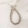 Nuevo Colgante Llavero de Coche con Forma de Corazón, Accesorio Creativo para Llaves con Cadena de Bolas Metálicas, Decoración para Estuche de Auriculares