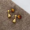 Pendientes de Calabaza Imitación Metal Maillard Piedra Ojo de Tigre para Mujer 2025 Nuevos Pendientes Populares de Gama Alta Pendientes Retro Otoño e Invierno