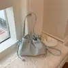 Bolsa tote única y elegante con cordón para mujer, nuevo modelo primavera 2026, simple y casual, elegante bolso de hombro para ir al trabajo, moderno
