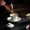 Cuenco de bambú azul pintado a mano de estilo Miji con tapa transparente, juego de té de kung fu de cerámica para el hogar, cuenco de té de mano antiescaldamiento.