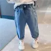 Jeans de primavera y otoño para niños y niñas, pantalones largos de color liso holgados estilo coreano, elegantes y modernos, para bebés y niños.