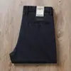 Estación europea verano delgado lino algodón mezclado transpirable cómodo cintura media-alta hombres rectos holgados casuales pantalones