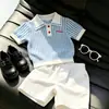 Estilo Coreano Niños Verano 2026 Nuevo Top de Punto Bordado Rayas Azules Cuello Polo Manga Corta Pantalones Cortos Casuales para Niños